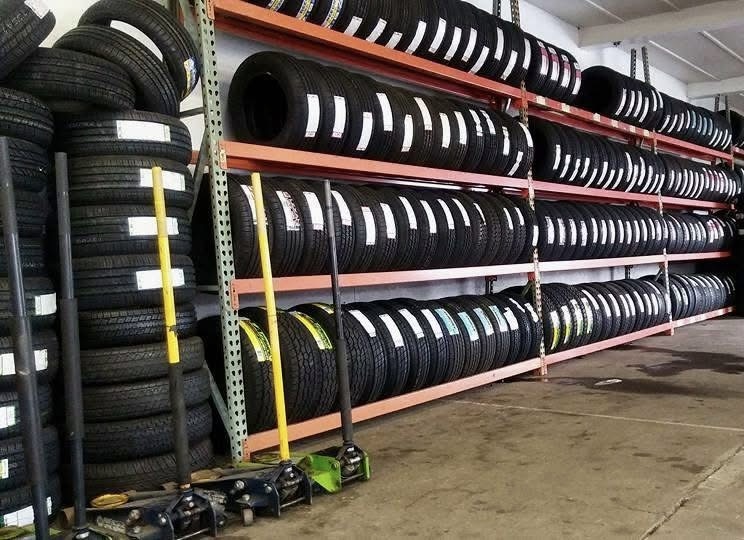 shelves of tire inventory inside MC Wheels and Tires
